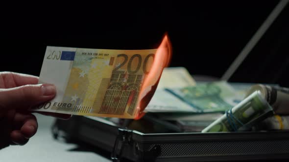 Burning Two Hundred Euro Banknotes Flame of Fire From Money