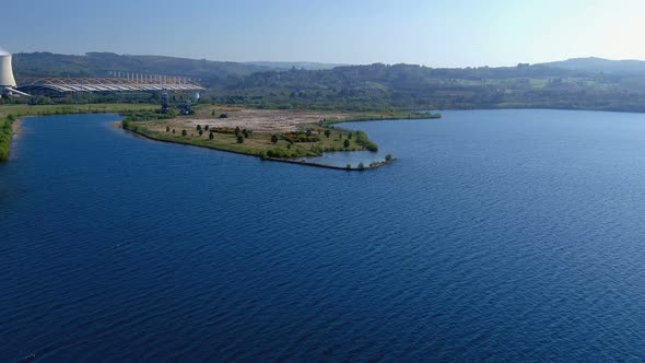 aerial view of the lake and the thermal power plant for the production of electricity with the old f