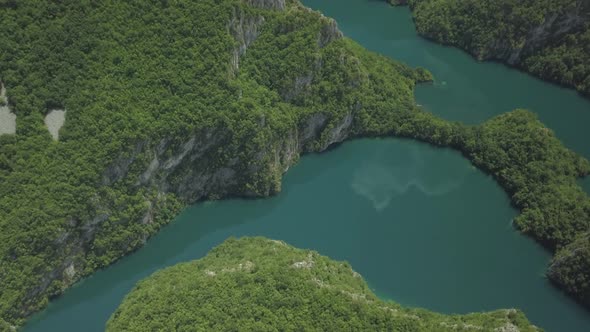 Aerial view of mountains and Piva lake in Montenegro in summer time