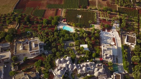 Drone view of a swimming pool in the countryside of southern Italy