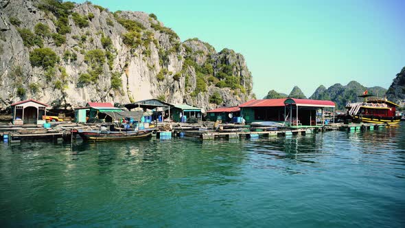 Floating Fishing Village In The Ha Long Bay. Cat Ba Island, Vietnam.
