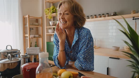 beautiful senior woman spending time home