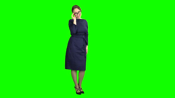 Teacher Posing and Adjusting Glasses. Green Screen