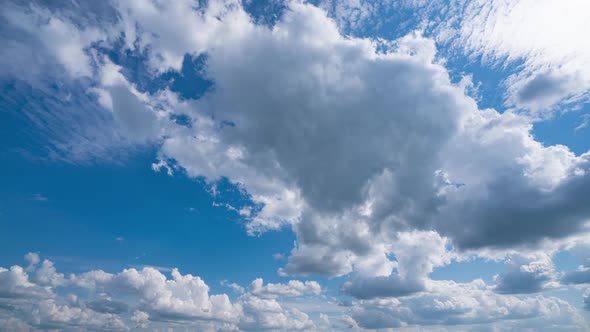 Air Plane Window View Time Lapse Clouds and Blue Sunny Sky Loop of White Clouds Over Blue Sky with