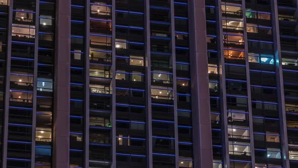 Big Glowing Windows in Modern Office and Residential Buildings Timelapse at Night