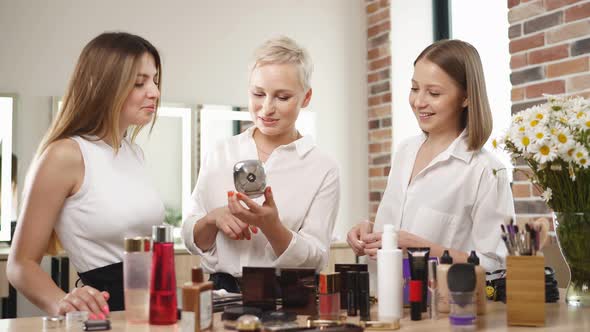 Make-up Artist and Girls Pupils Discuss Cosmetics on Master Class