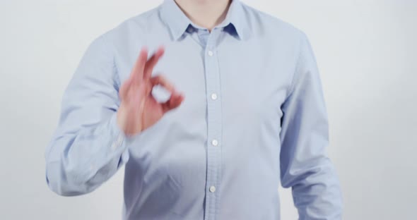 Man showing the "OK" sign