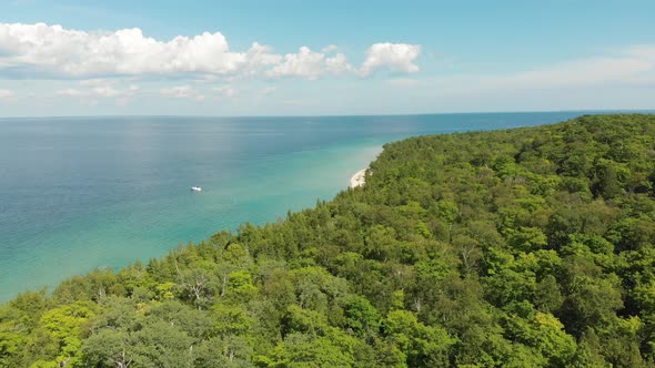 Aerial view of turquoise Lake Huron waters from Mackinaw Island State Park