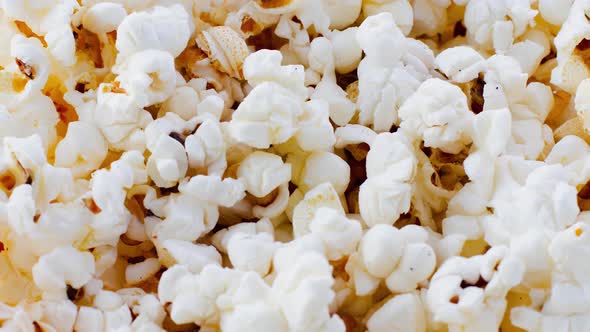 Fresh Beautiful Popcorn Closeup Rotates As Background