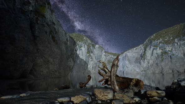 Hyperlapse of Night Starry Sky with Mountain and Ocean Beach in Lofoten Norway