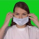 Young Caucasian Beautiful Woman Put on Protective Face Mask - VideoHive Item for Sale