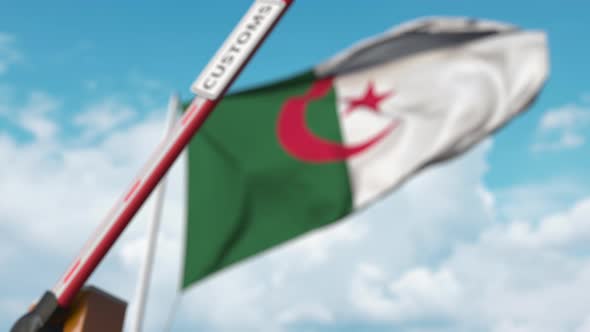 Barrier Gate with CUSTOMS Sign Closed at Flag of Algeria alt