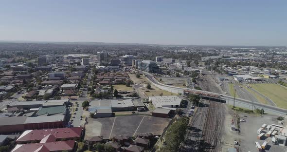 Aerial decent into Dandenong showing the larger developments and detail infrastructure and public tr