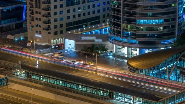 Aerial View of Dubai Tram in Dubai Marina Night Timelapse