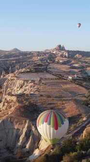 Vertical Video of Hot Air Balloons Flying in the Sky Over Cappadocia Turkey