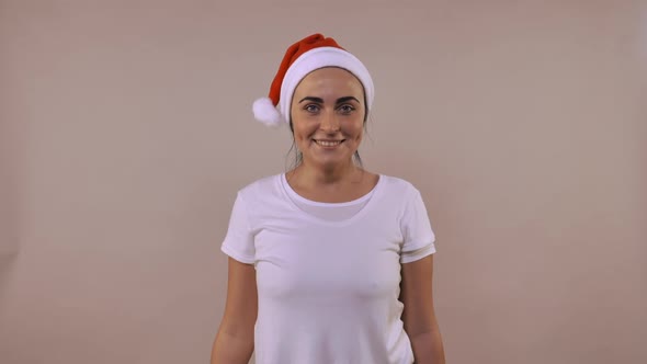 Cheerful Female Posing Christmas Hat