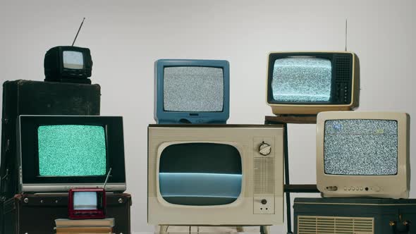 Old Televisions with Grey Interference Screen on Light Background