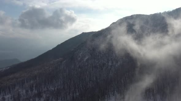 Top of the highlands in the fog 4K drone video