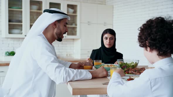 arabian family spending time together at home