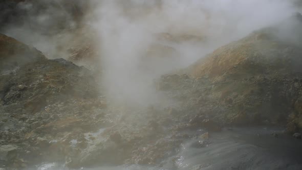 dramatic iceland landscape scenery, geothermal hot spring steam smoke rising, wide angle,