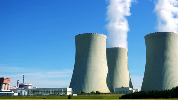 Factory (Nuclear Power Station) - Closeup of Buildings and Smoke From Chimney