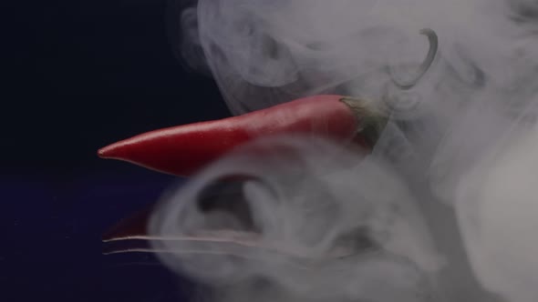 Red hot pepper in smoke