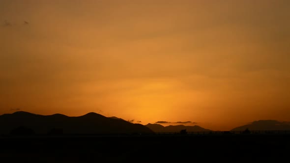 Airplane Arriving to Airport at Sunset