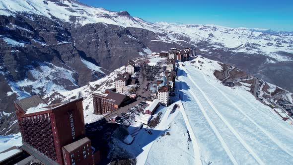 Panoramic view of Ski station centre resort at snowy Andes Mountains.