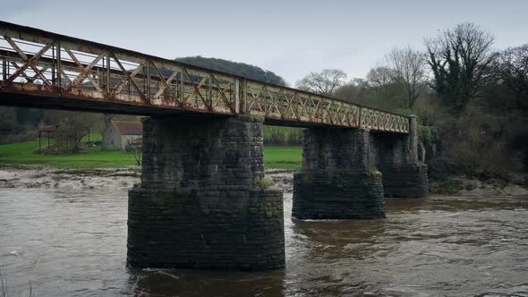 Old Train Bridge Over River