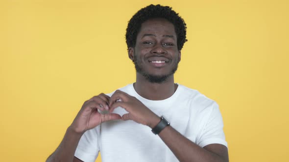 Handmade Heart By African Man, Yellow Background