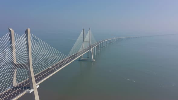 Lisbon Portugal Aerial View of the Vasco Da Gama Bridge on a Foggy Beautiful Morning During Car