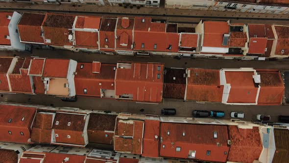 Aerial Motion Over Street Old Buildings with Brown Roofs