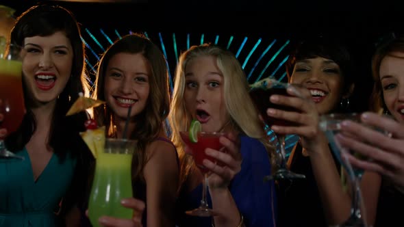 Beautiful women having a glass of cocktail in bar