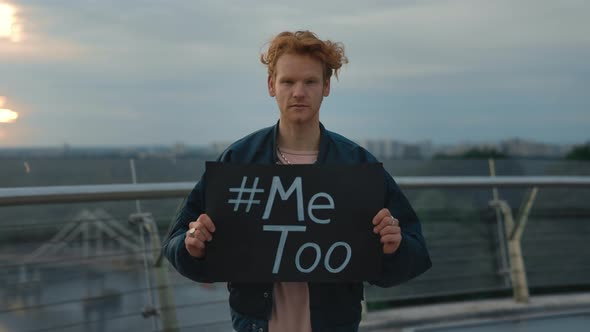 Male Activist Holding Card with Hashtag Me Too