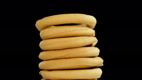 Traditional Italian Bagels Pile Turns on Black Background