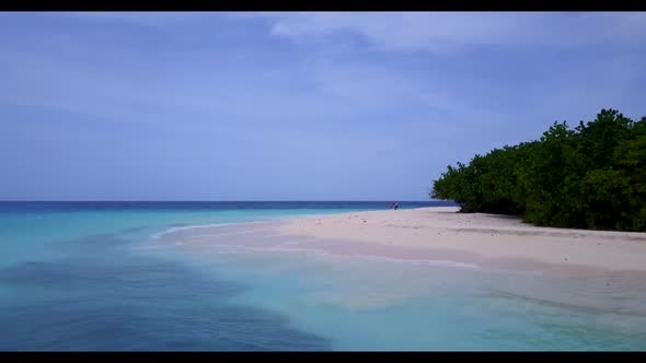 Aerial flying over abstract of idyllic resort beach voyage by transparent ocean and white sandy back