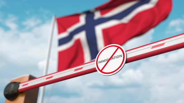 Barrier with No Immigration Sign Opened with Flag of Norway As a Background
