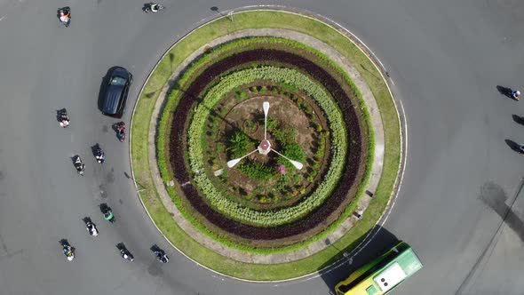 Traffic atmosphere at an intersection with a park circle in the middle in Yogyakarta City