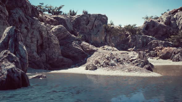 Coastal View of a Sand Beach with Cliffs