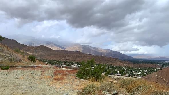 4k timelapse desert mountain on cloudy day overlooking valley. Palm Springs, California