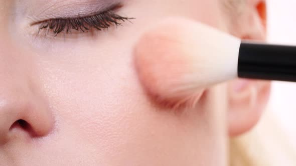 Makeup Artist Applying Blush With Brush.