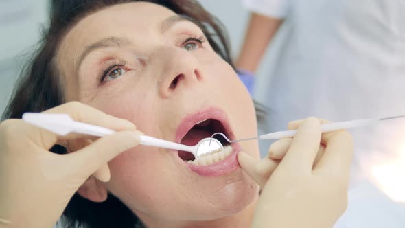 A Woman is Having a Dental Checkup