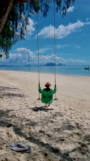 Woman on the Beach of the Tropical Island Naka Island Near Phuket Thailand Woman at a Swing on the