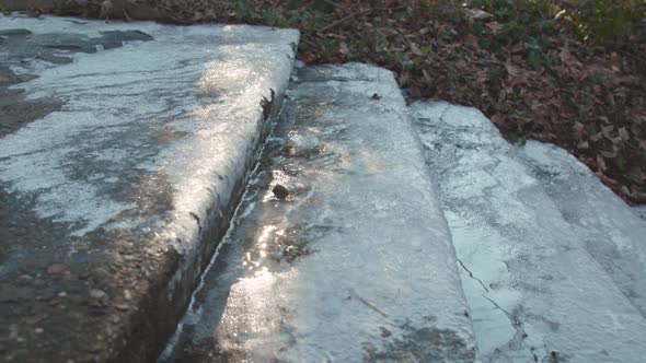 Ice on Stone Stairs Outside in the Winter Below Freezing