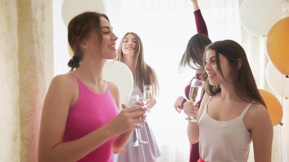 Beautiful Female Friends Dancing and Having Fun at Hen Party