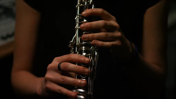 Woman playing a clarinet