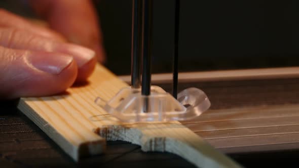 sawing wood with electric jigsaw