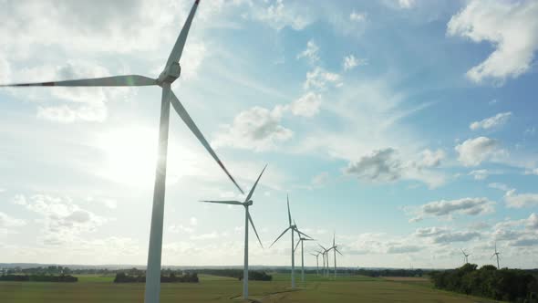 Aerial View Windmill Farm Beautiful Field in the Golden Hour Sunset