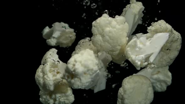 Pieces of Cauliflower Fall Into the Water