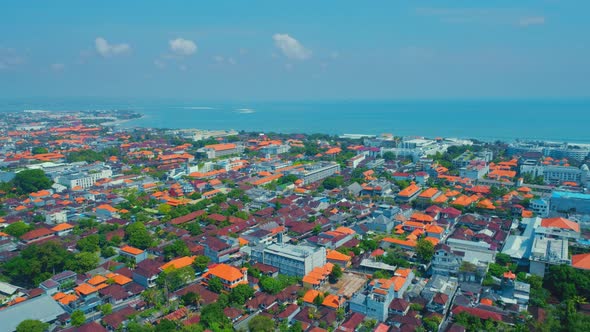 Flight Overlooking the City of Bali on the Indian Ocean 